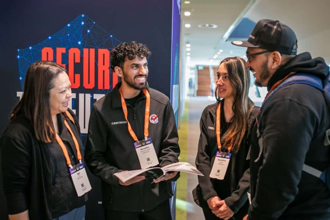 visitors connecting in front of security exhibition entrance